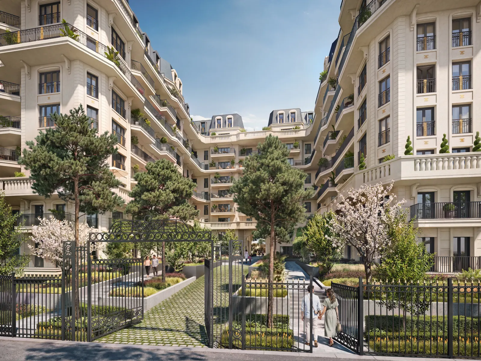 Cour d’honneur et jardins de la résidence, derrière la grille d’entrée